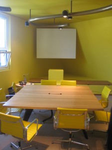 Vitra EA 108 The yellow room at Vitra HQ in Basel with EA 108 from Charles and Ray Eames.