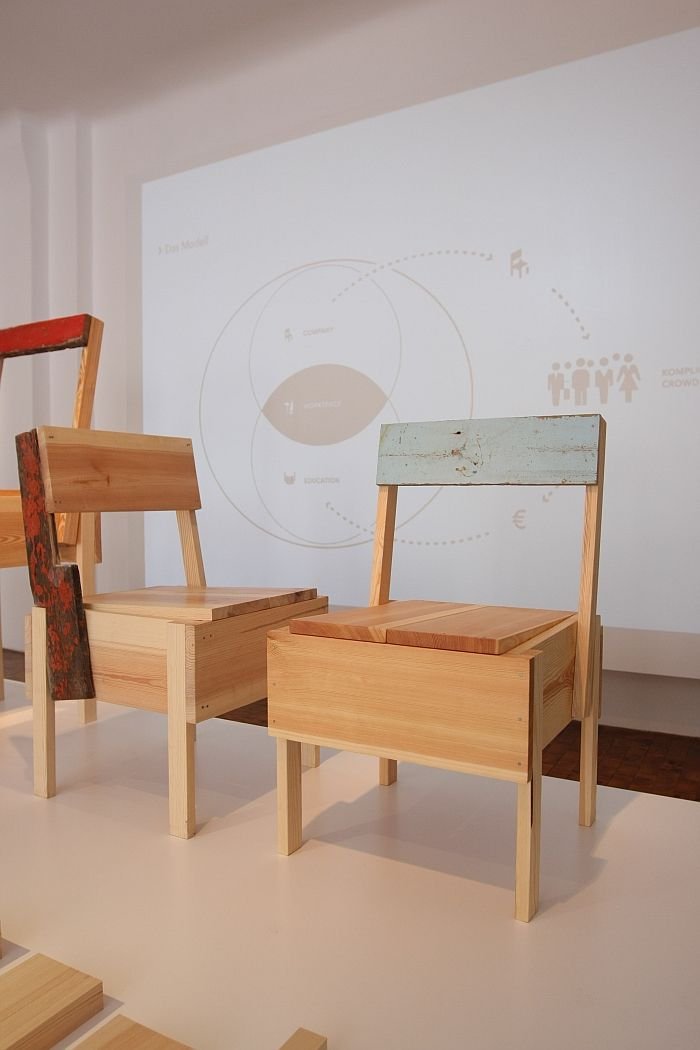 Wood from Lampedusa refugee boats, and its integration into furniture, as seen at CUCULA – Refugees Company for Crafts and Design at the Werkbundarchiv – Museum der Dinge Berlin